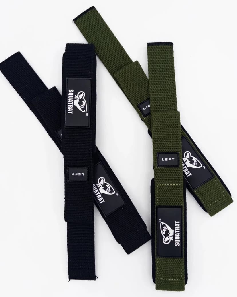 SQUATRAT plain cotton lifting straps, black and olive straps arranged in a crossed product layout.